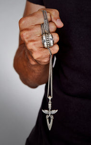 man wearing sterling silver king baby jewelry