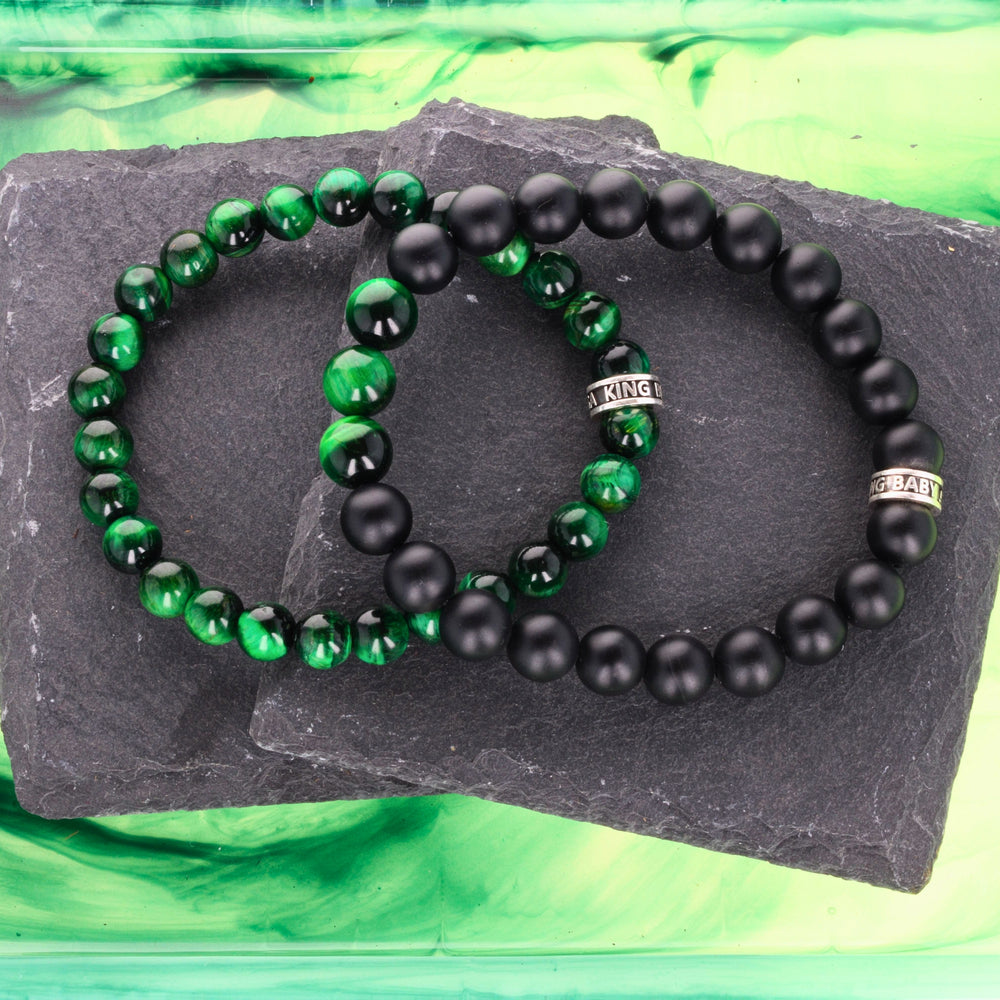 2 beaded bracelets on slate