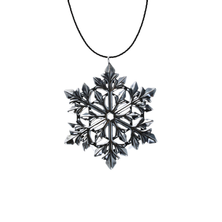 Snowflake Ornament on white background with black cord