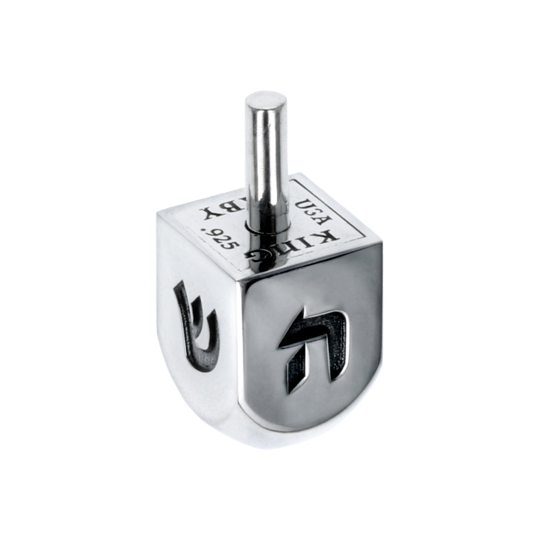 Silver Dreidel on white background