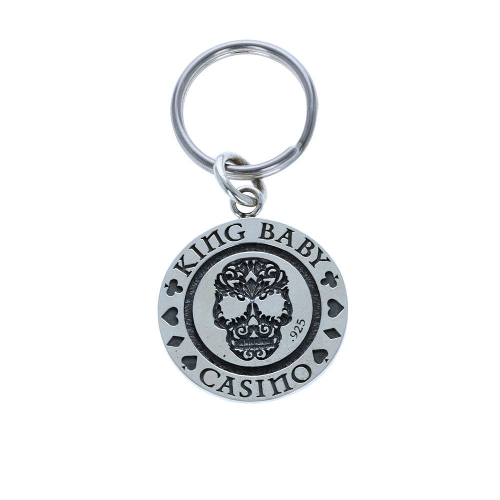 Keychain with 'King Baby Casino' logo on a white background