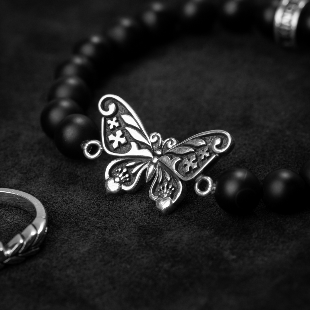 Black Butterfly Tattoo Beaded Bracelet on Black Background