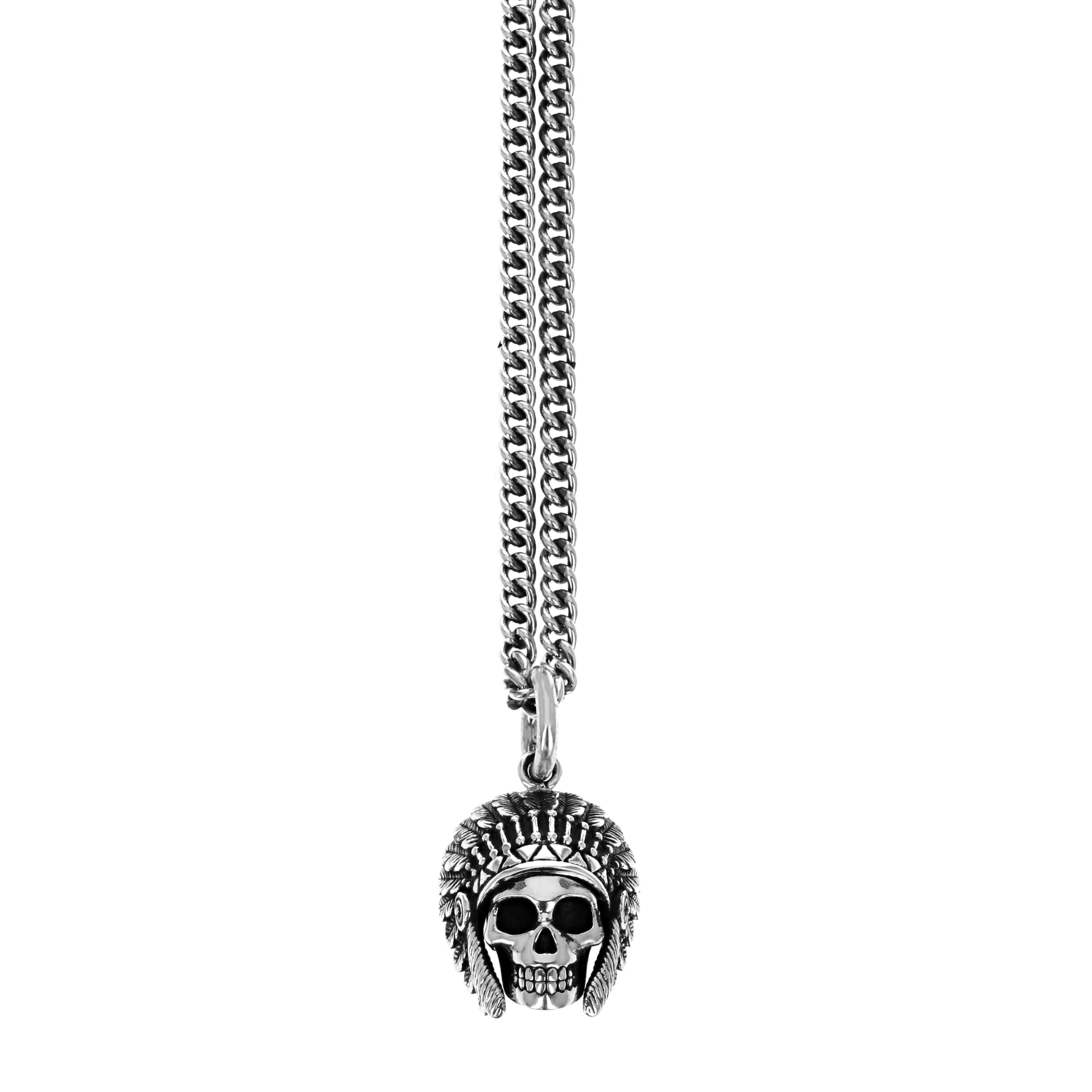 Product shot of skull pendant with feather headress on