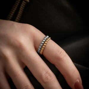 10K Gold & Silver Super Micro Heart Stackable Ring on Models hand close up