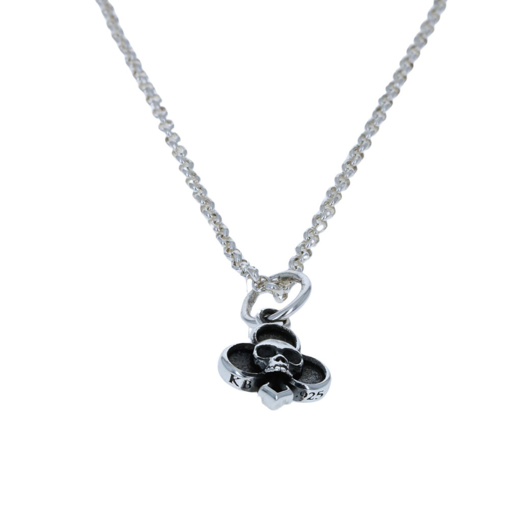 Club skull suit pendant on black background