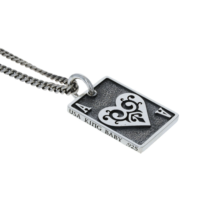 Ace heart card pendant on white background