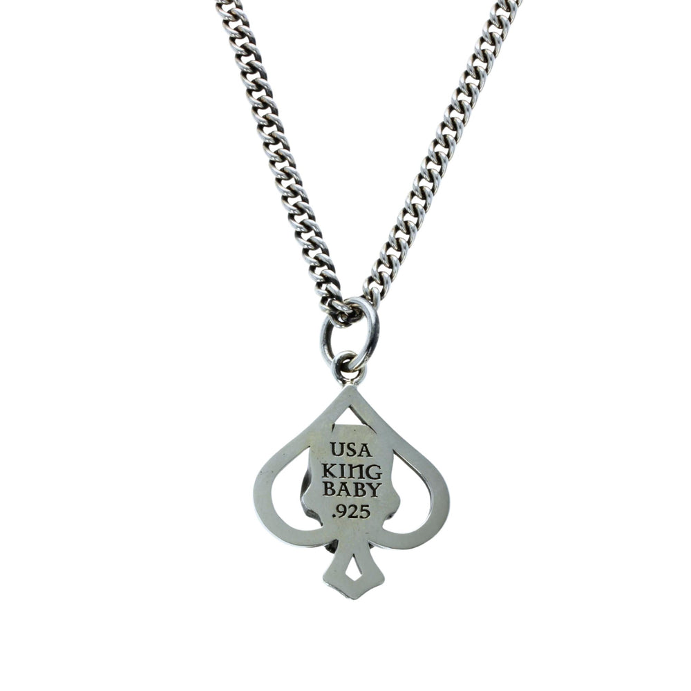 Cut out spade pendant on white background back view