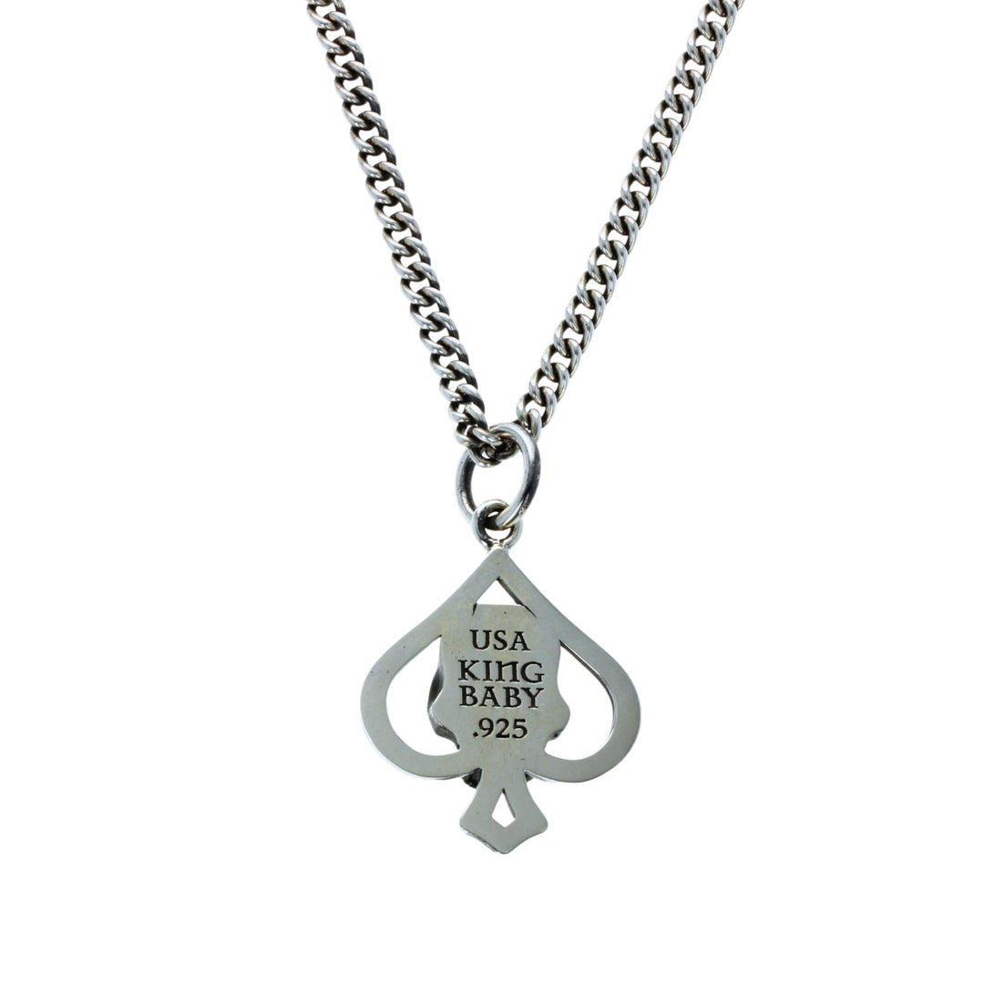 Cut out spade pendant on white background back view