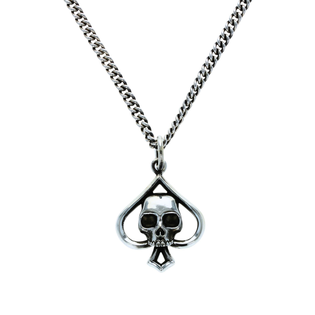 Cut out spade pendant on white background