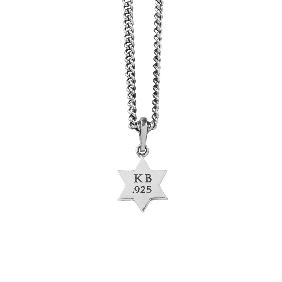 Star of David pendant with smaller star of david in the middle on white background back view