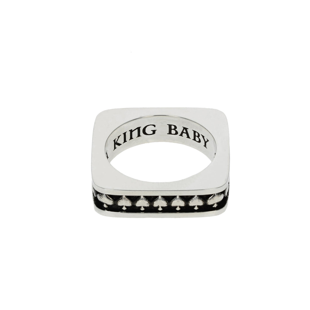 Silver Spade ring with 'KING BABY' engraving on a white background