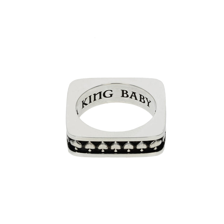 Silver Spade ring with 'KING BABY' engraving on a white background