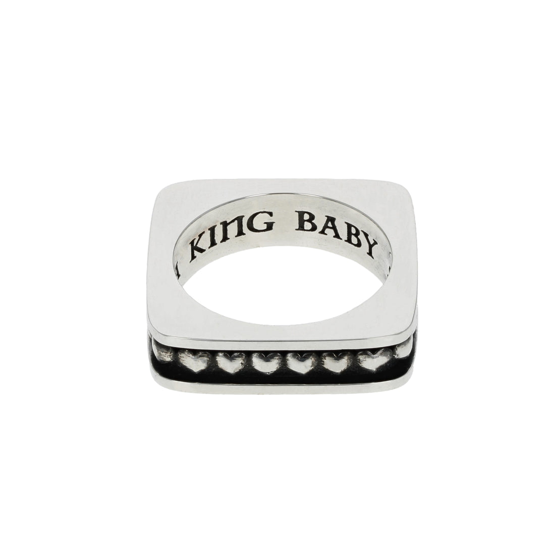 Silver Heart ring with 'KING BABY' engraving on a white background