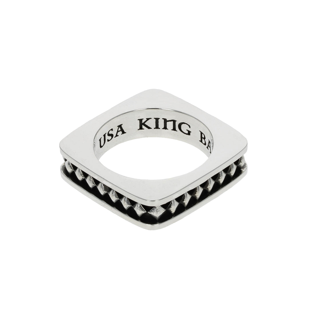 Silver ring with 'USA KING' engraving on a white background 3/4 view