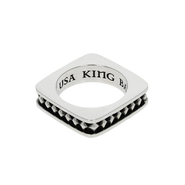 Silver ring with 'USA KING' engraving on a white background 3/4 view