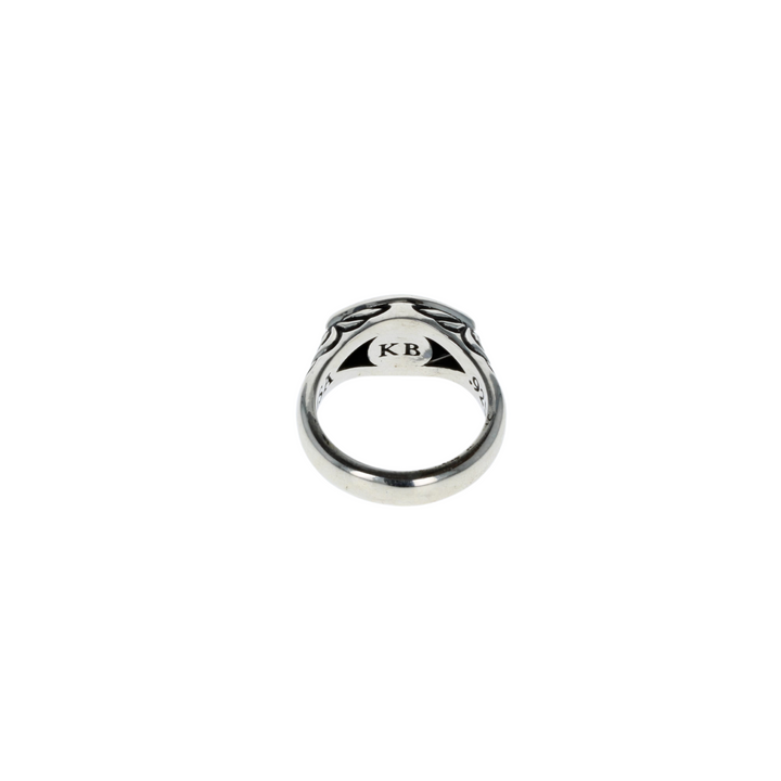 Evil eye ring on white background back view