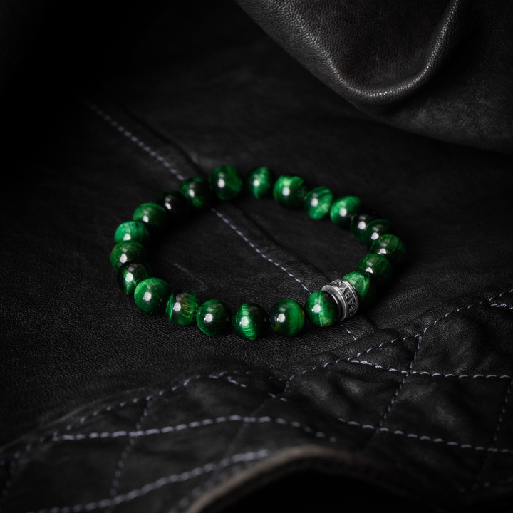 10mm Green Tiger Eye Beaded Bracelet w/ Logo Ring on black leather background