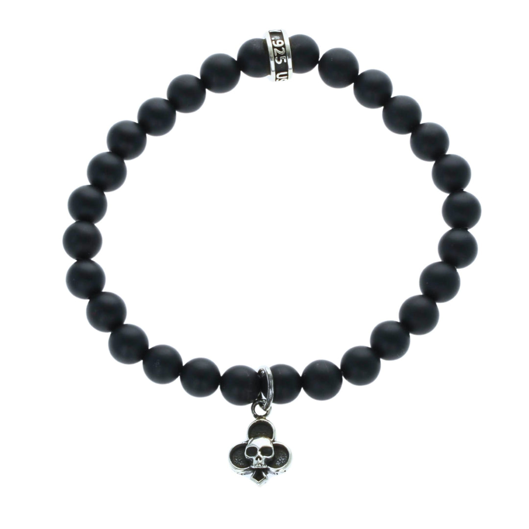 Black beaded bracelet with a club skull charm on a white background