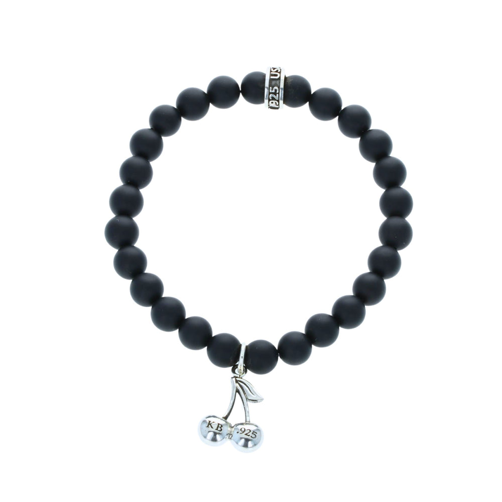 Black beaded bracelet with a silver charm on a white background back