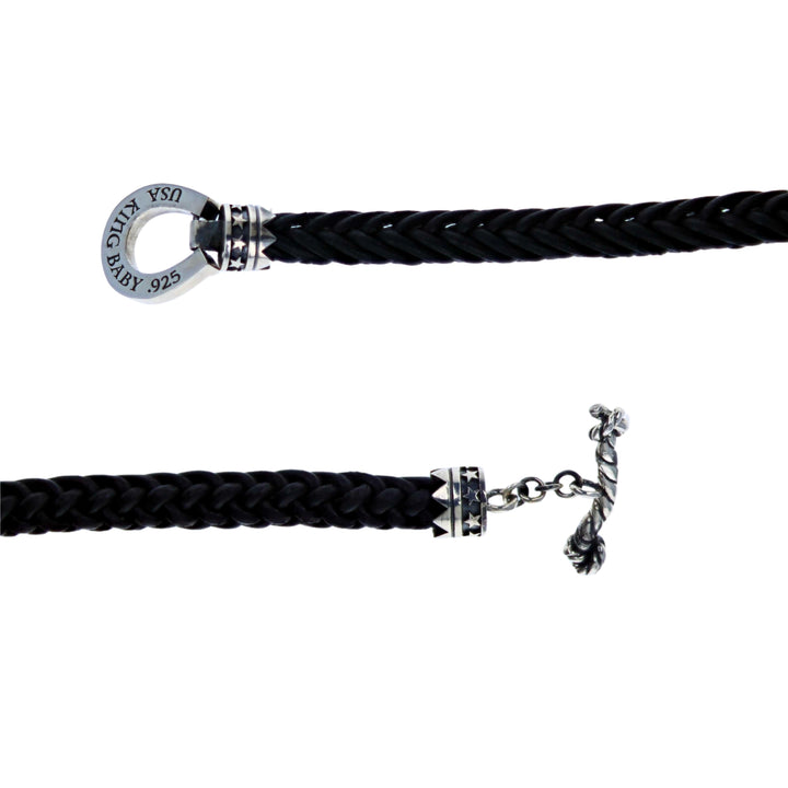 Black braided leather bracelet  with silver clasp on a white background