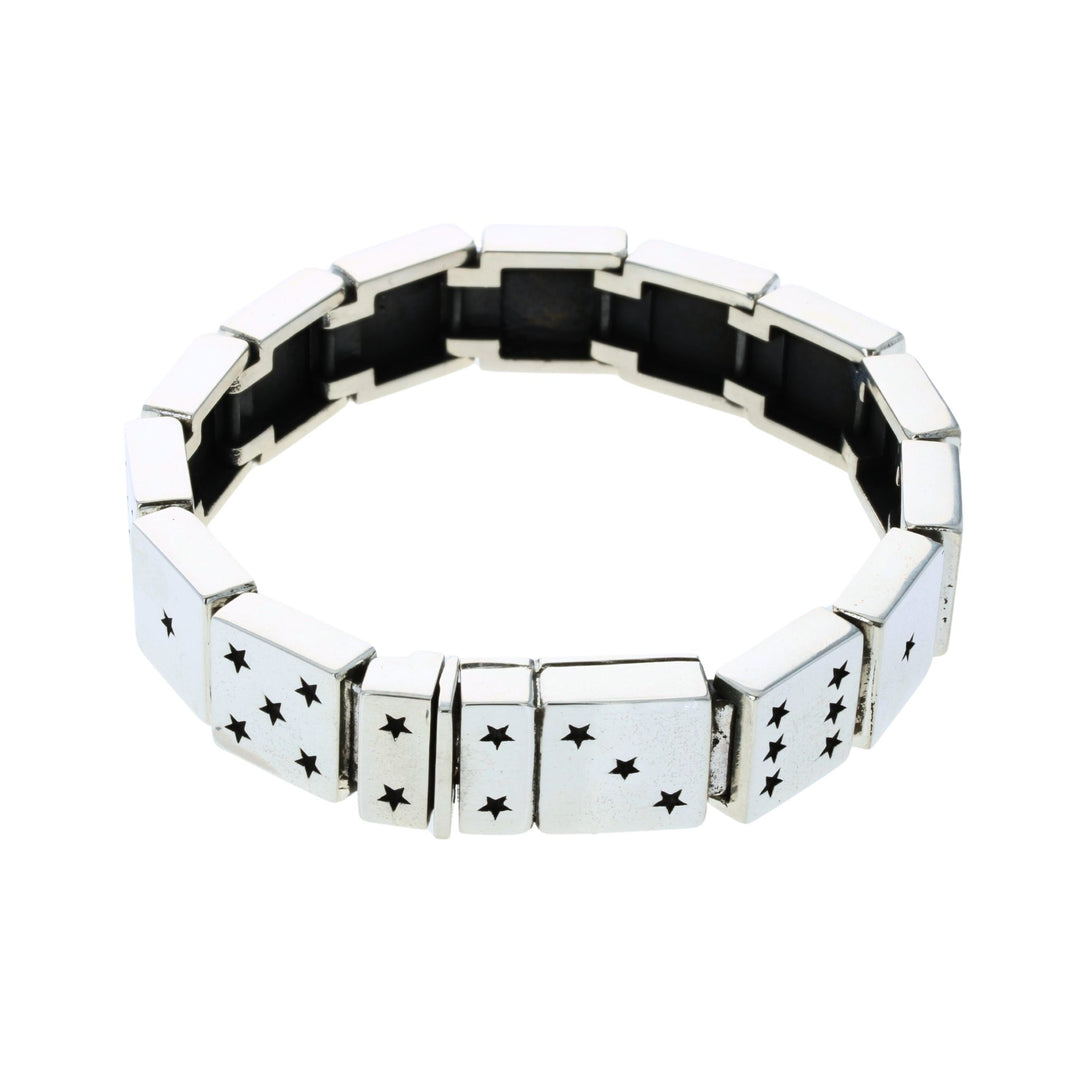 Silver bracelet with Dice star patterns on a white background