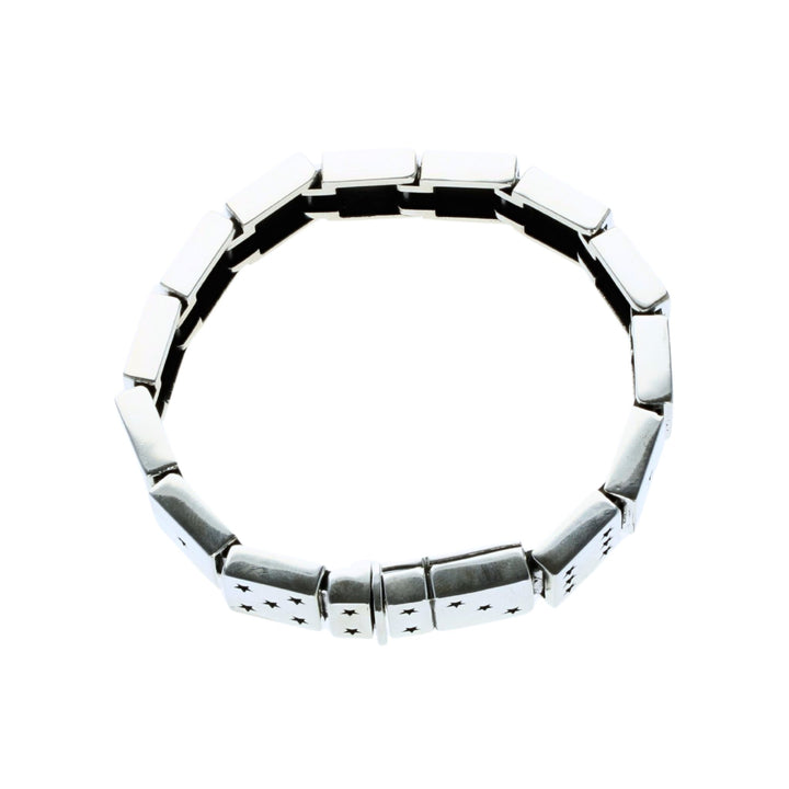 Silver bracelet with Dice star patterns on a white background top
