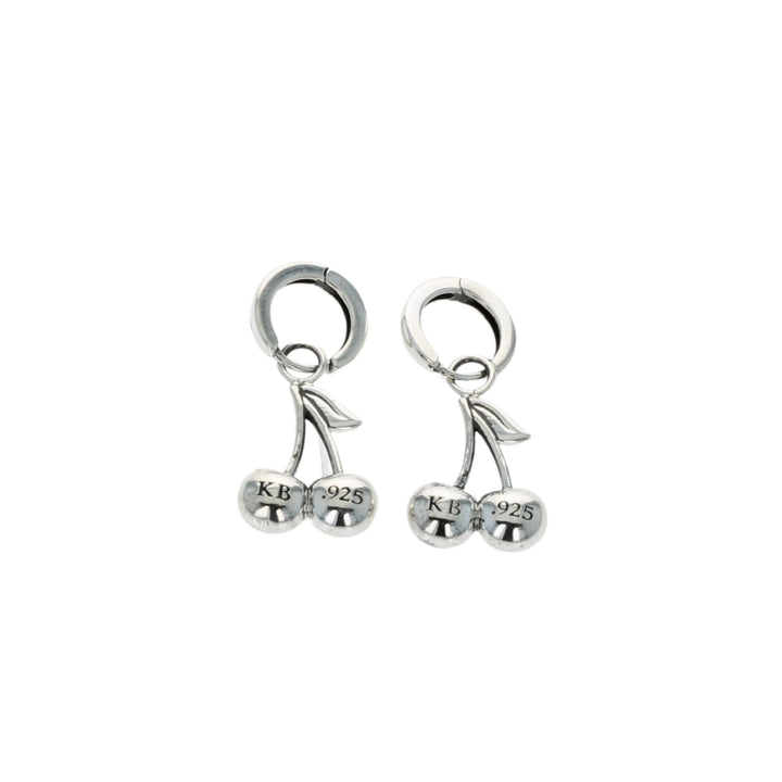 Silver cherry-shaped earrings on a white background