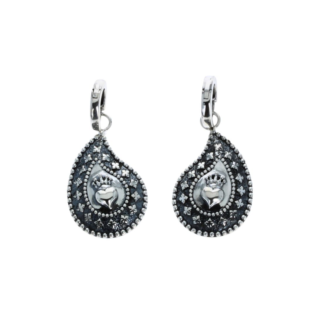 Pair of black teardrop earrings with silver accents on a white background