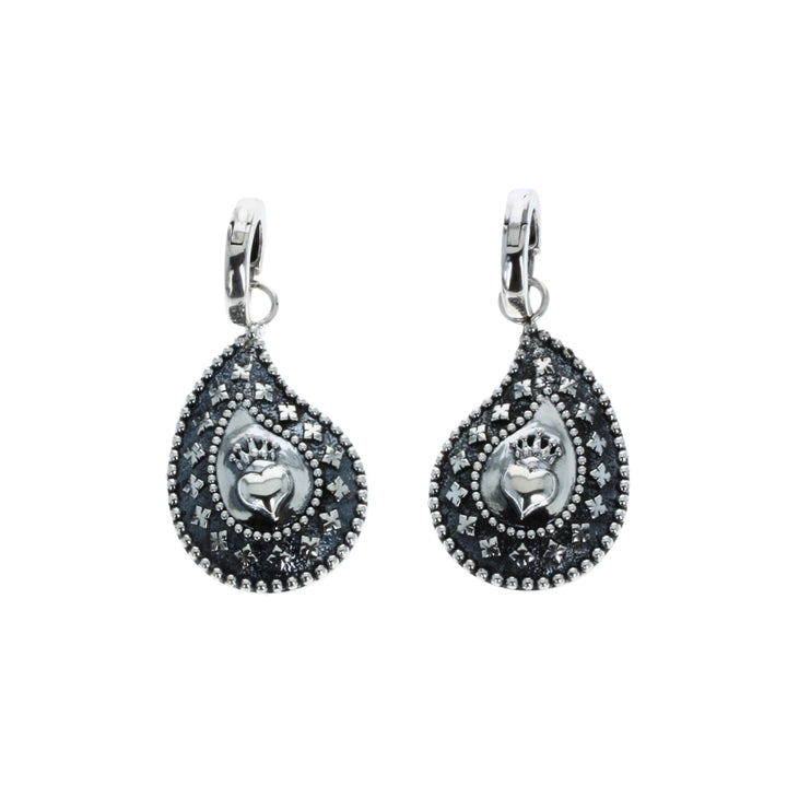 Pair of black teardrop earrings with silver accents on a white background