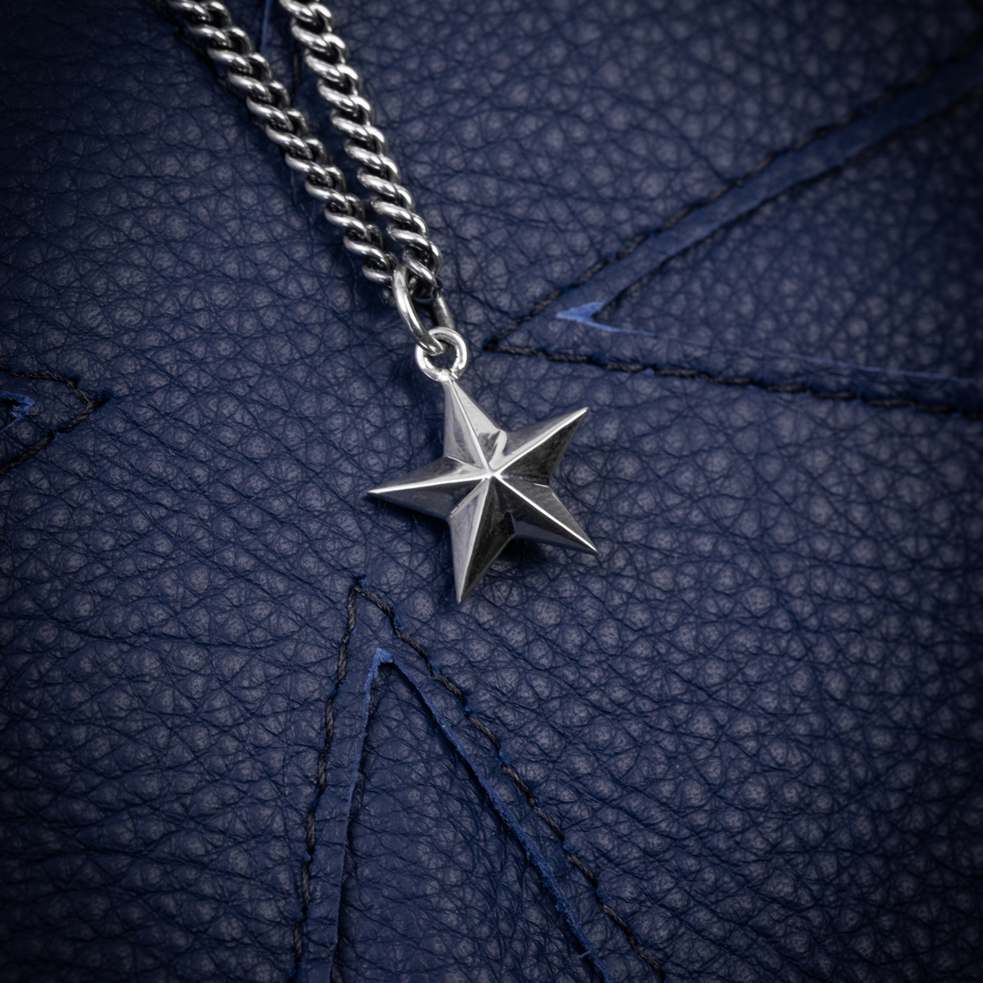 Star Pendant on Blue Background