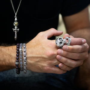 man wearing sterling silver jewelry, bracelets, skull ring made in the USA