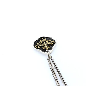 king baby silver and gold shield pendant