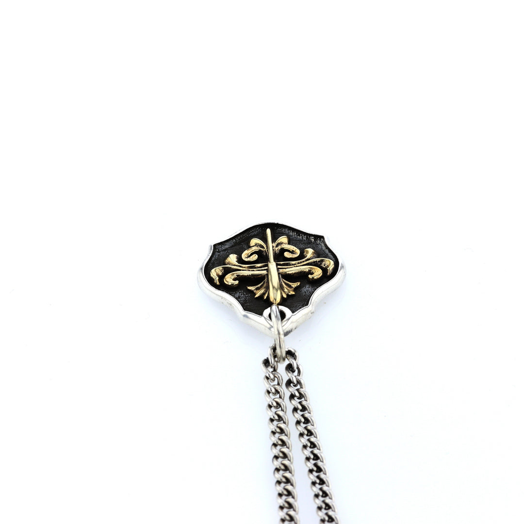 king baby silver and gold shield pendant