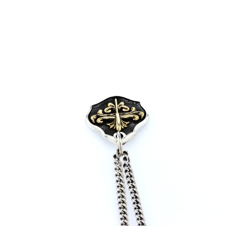 king baby silver and gold shield pendant