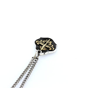 king baby silver and gold shield pendant
