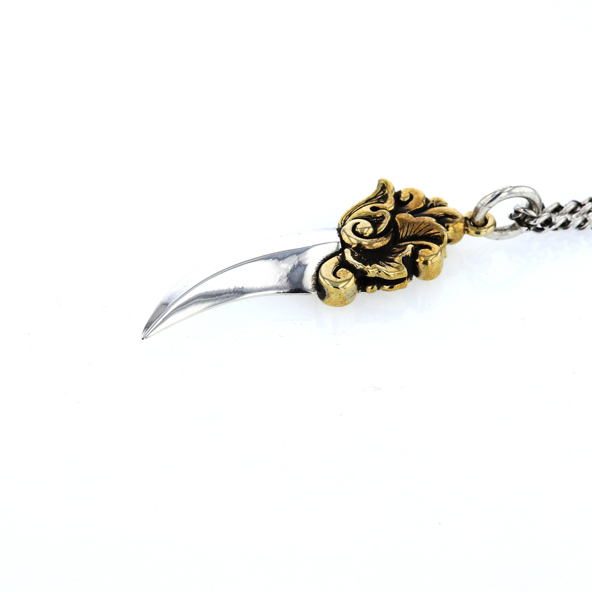 king baby silver and gold dagger pendant