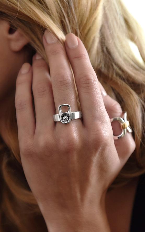 woman wearing sterling silver rings