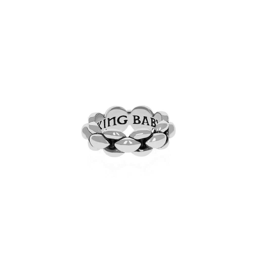 Photo of silver infinity link ring with King Baby Logo on inside of band