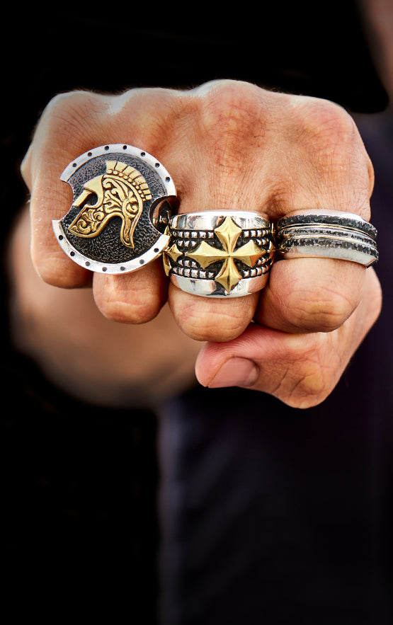 man wearing sterling silver king baby jewelry