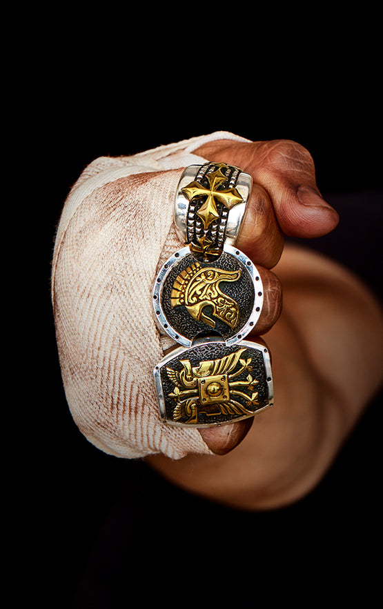 man wearing sterling silver king baby jewelry