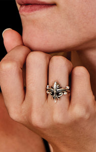 woman wearing sterling silver king baby jewelry