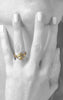 woman wearing 18k gold king baby ring