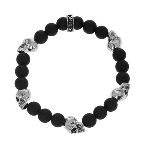 8mm Black Onyx Bead Bracelet w/ 5 skull beads on white background