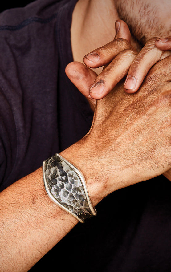 man wearing king baby jewelry