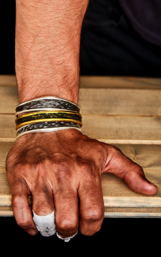 man wearing king baby jewelry