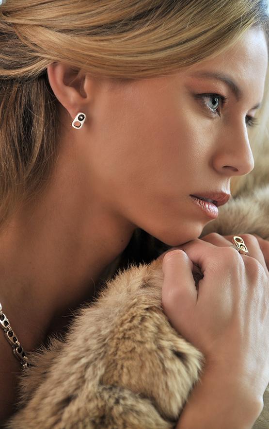 woman wearing king baby sterling silver earrings