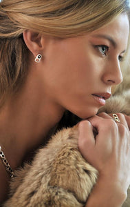 woman wearing king baby sterling silver earrings