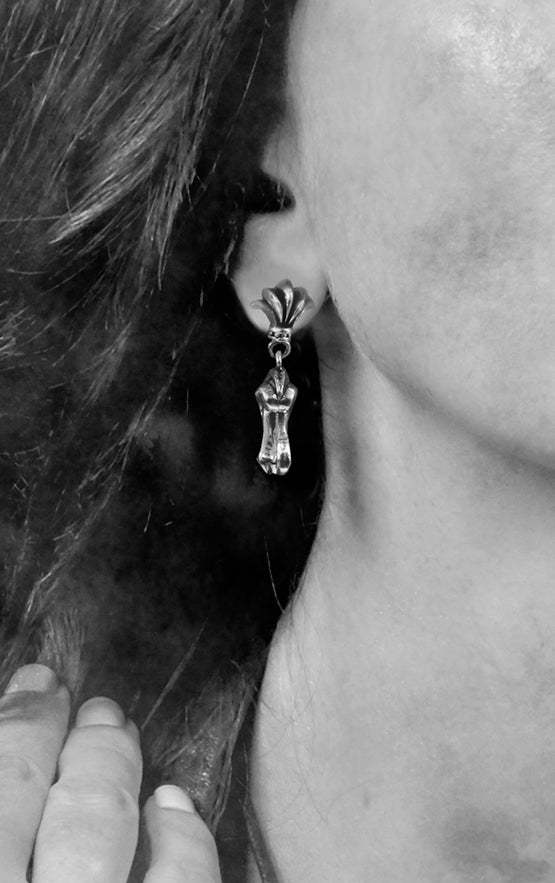 woman wearing king baby sterling silver jewelry