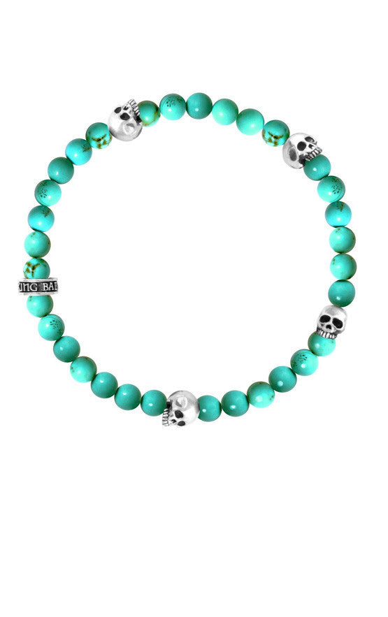 6mm Turquoise Bead Bracelet w/ 4 Skulls